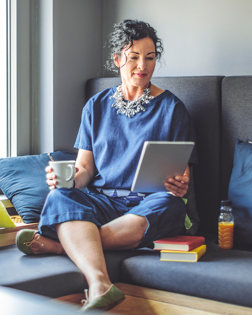 A manager checks the rewards from their Visa Signature Credit Card.