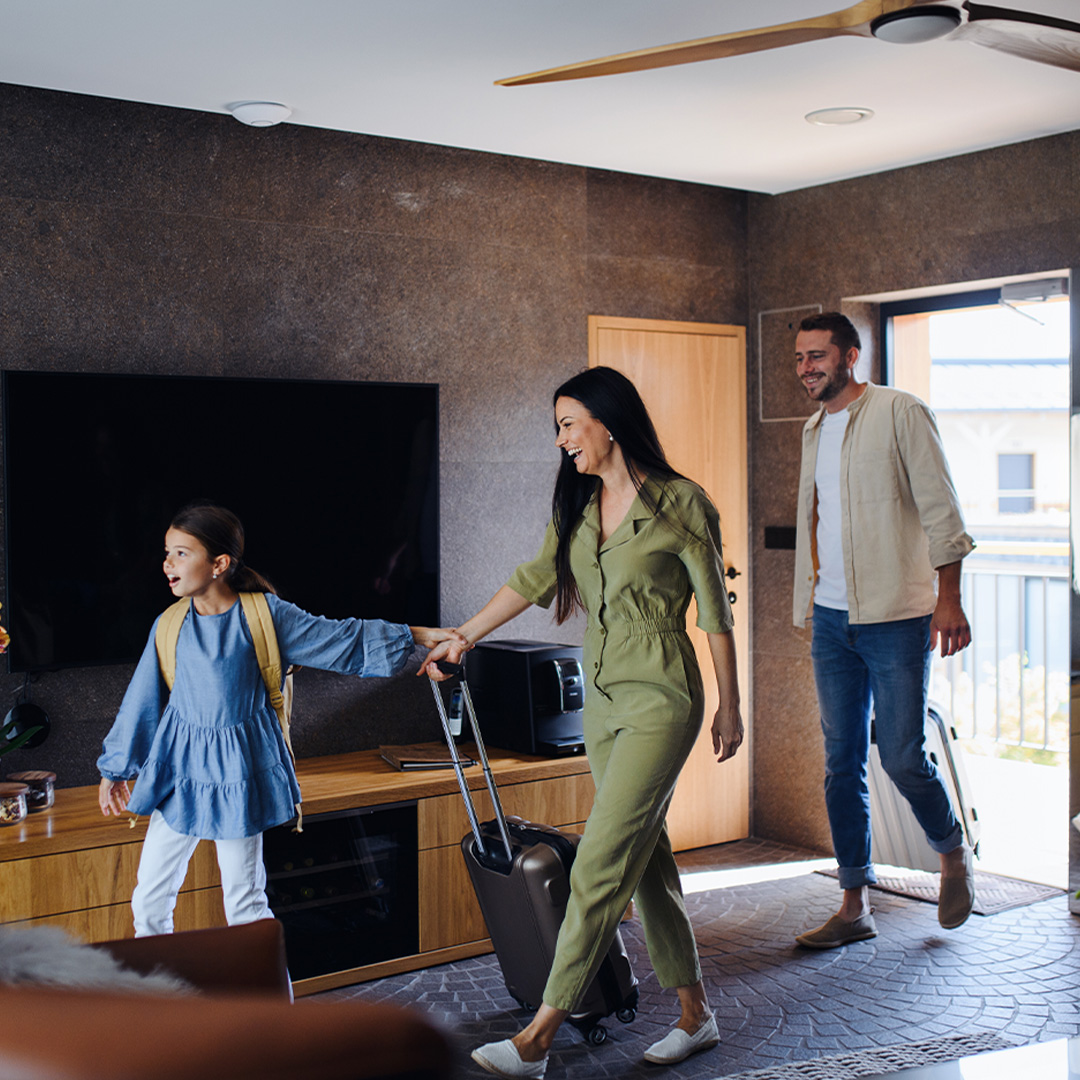 A family on vacation enjoying the benefits of Amerant's Financial advice.