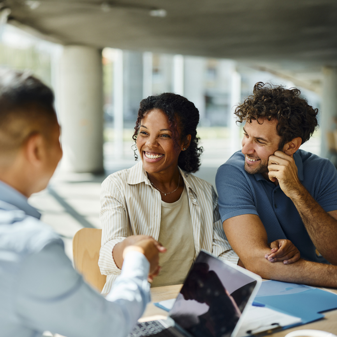 couple discusses securities based lending with wealth advisor provided by amerant investments