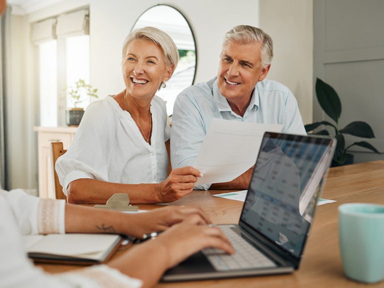 amerant wealth advisor offers portfolio advisory services to a happy couple